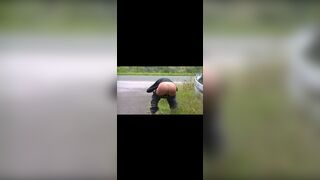 Girl in a black turtleneck poops by the road, ScatKings.com Scat Porn 1 ScatKings.com Scat Porn